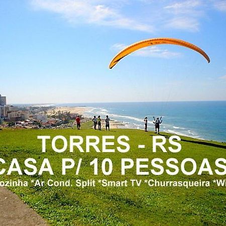 Villa Casa De 2 Quartos Com 2 Ares-Condicionados Em Torres-Rs - Na Mais Bela Praia Gaucha - Cozinha - Banheiro - Tv Smart 32 E Wi-Fi - Estacionamento - Anfitria Superhost No Bnb Exterior foto
