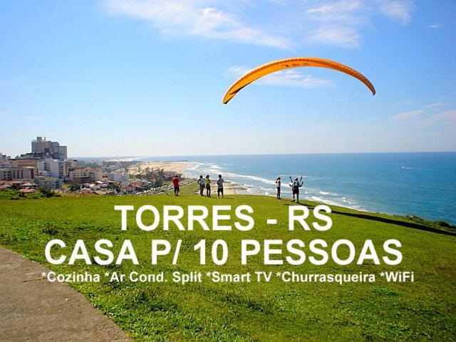 Villa Casa De 2 Quartos Com 2 Ares-Condicionados Em Torres-Rs - Na Mais Bela Praia Gaucha - Cozinha - Banheiro - Tv Smart 32 E Wi-Fi - Estacionamento - Anfitria Superhost No Bnb Exterior foto